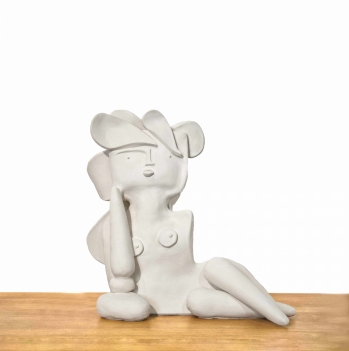 grande_baigneuse_accoudee_sur_galets